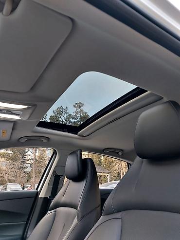 Chery: Model: Omoda A05 (sedan) Rəng: ağ Yanacaq sistemi: hibrid (benzin + — 8