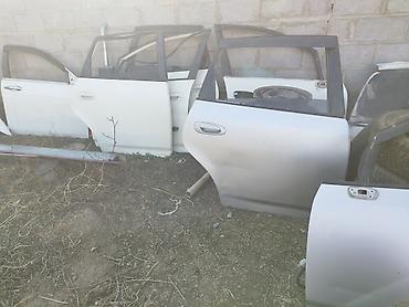r17 sonata: Комплект автомобильных дверей белого цвета. В наличии дверные — 1