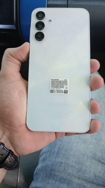 telefon klaviaturası: Samsung Galaxy A15, 128 ГБ, цвет - Голубой, Сенсорный, Отпечаток пальца, Две SIM карты