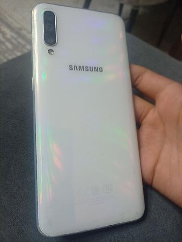 note 2: Samsung Galaxy A50, Б/у, цвет - Белый, 2 SIM — 1