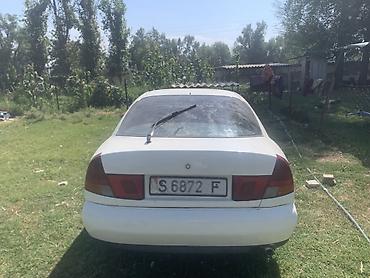 Унаа сатуу: Mitsubishi Carisma: 1995 г., 1.8 л, Кол менен иштөөчү, Бензин, Седан — 2