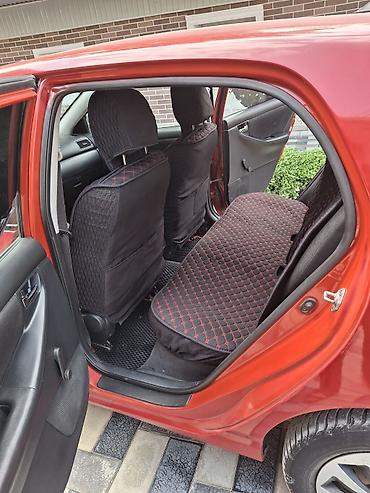 рул: Toyota Corolla: 2006 г., Автомат, Бензин, Хетчбек — 6