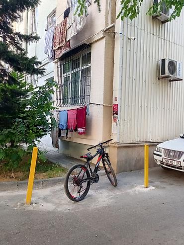 İdman velosipedləri: Bmx 26-lıq velosiped satılır qırmızı qara qarışığ rəng üstündə miqalja — 2