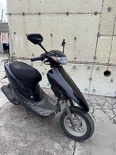 Скутер Honda Dio, черный цвет. Особенности и комплектация: - Легкий