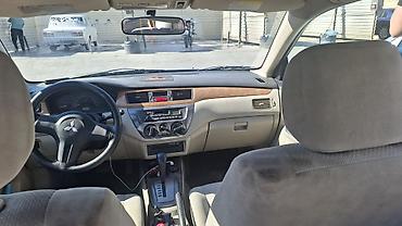 duman fara: Mitsubishi Lancer: 1.6 l | 2006 il 466000 km Sedan — 9