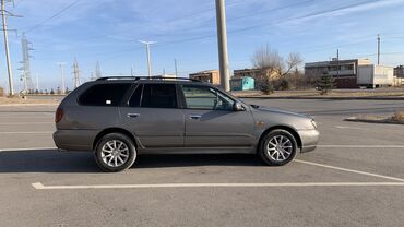 Nissan: Nissan Primera: 2001 г., 2 л, Механика, Универсал — 4
