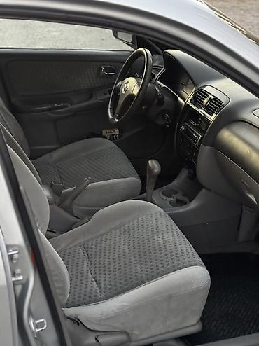 машины спорт: Mazda Capella: 2000 г., 2 л, Автомат, Бензин, Седан — 10