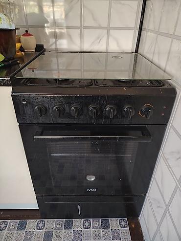 microwave oven: Газовая плита Artel с духовкой - 4 конфорки на газу: две стандартные — 1