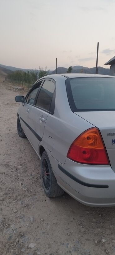 электрический мотороллер купить: Suzuki Liana: 2003 г., 1.6 л, Механика, Бензин, Седан