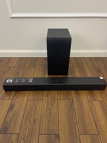LG Soundbar + simsiz sabvufer dəsti Yeni Xüsusiyyətlər: - 2.1 kanal