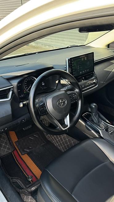 2022: Toyota Corolla: 2022 г., 1.8 л, Вариатор, Гибрид, Седан — 5