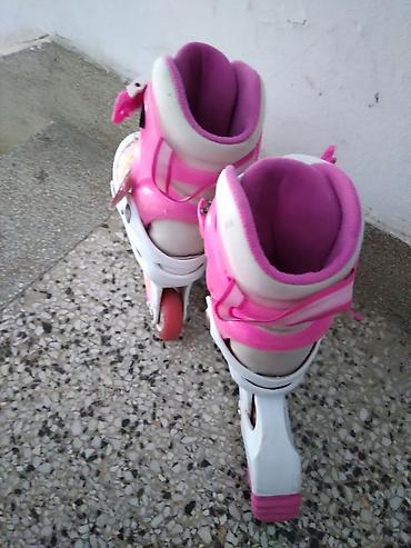 powerslide roleri: Roleri Action roze podesivi br. 30-33, sa pertlama i silikonskim — 3