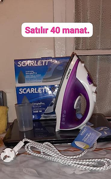 candan ütü: - Scarlett buxarlı ütü, SimplePro seriyası. 1600 W güc. GlissAir tipi — 1