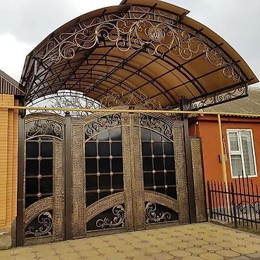 Кованные ворота и навесы под заказ - Изготовление кованных распашных