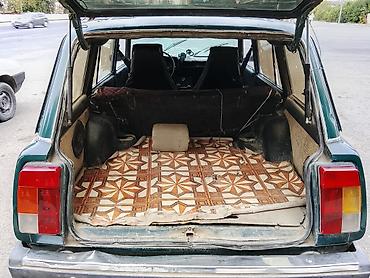 klassik maşınlar: Model: VAZ 2104 (universaI kuzov) Rəng: Tünd yaşıl Yanacaq növü — 2