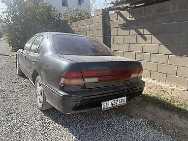 механическая: Nissan Maxima: 1996 г., 2 л, Механика, Бензин, Седан — 5