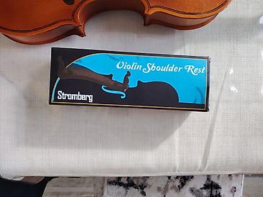 Skripkalar: Skripka dəsti Tərkib: - Tam ölçülü klassik skripka (4/4) - Yay - — 2