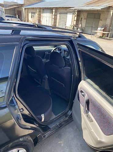 жукили: Nissan Primera: 2000 г., 1.8 л, Механика, Бензин, Универсал — 4