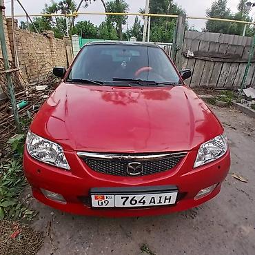 мазда фамили: Mazda 323: 2003 г., 1.5 л, Механика, Бензин, Хэтчбэк — 5