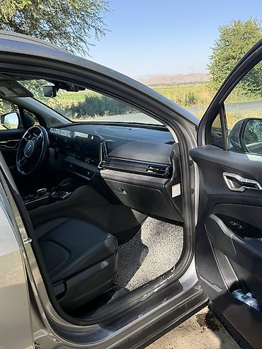салон машины: Kia Sportage: 2022 г., 1.6 л, Автомат, Гибрид, Кроссовер — 5