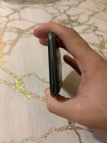 i̇phone 11pro max: IPhone 11 Pro, 64 GB, Matte Midnight Green, Face ID — 7