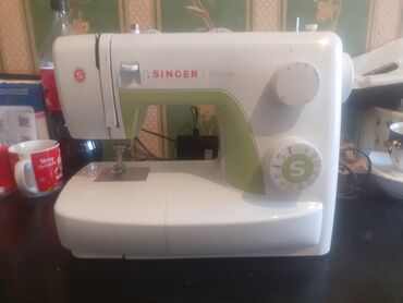 Tikiş maşınları: Tikiş maşını Singer, Elektromexaniki