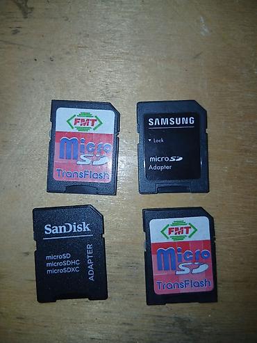 Foto və videokameralar: Şəkildə olanlar microSD → SD adapterləridir. (kartın özü deyil, sadəcə — 1