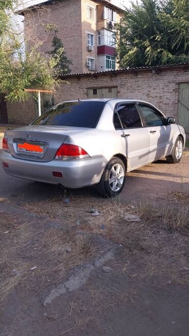 Mitsubishi: Mitsubishi Lancer: 2005 г., 1.3 л, Механика, Бензин