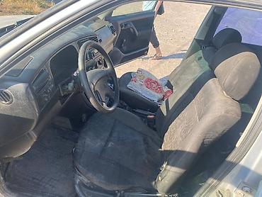 Транспорт: Volkswagen Vento: 1995 г., 1.8 л, Механика, Бензин, Седан — 4