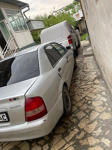 аренда mazda 323: Mazda 323: 2003 г., 1.4 л, Механика, Бензин, Седан — 4