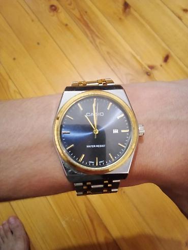 1001 xirdavat 24 saat: Casio qol saatı – Göy qızılı reng qolda çox gözel görkemi var - — 2