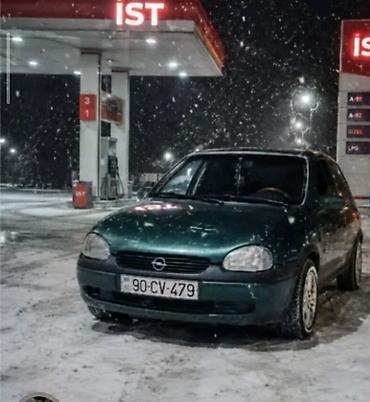 Opel: Opel Corsa (B) hetçbek - Gecə/fırtınalı havada çəkilmiş tünd yaşıl — 1