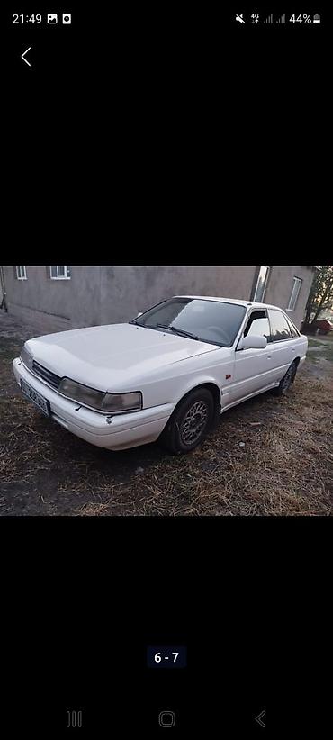 w210 430: Mazda 626: 1990 г., 2 л, Механика, Бензин, Седан — 10