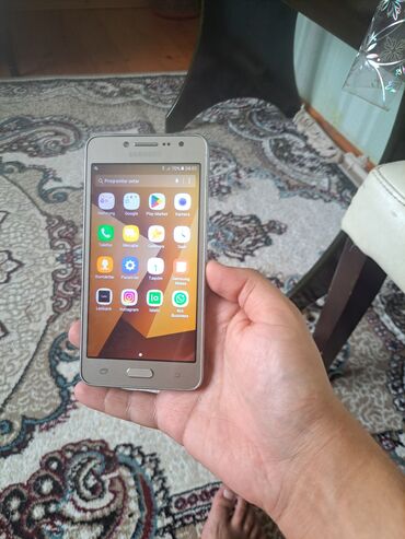 телефон fly nimbus 1: Samsung Galaxy J2 Prime, 16 ГБ, цвет - Золотой, Сенсорный
