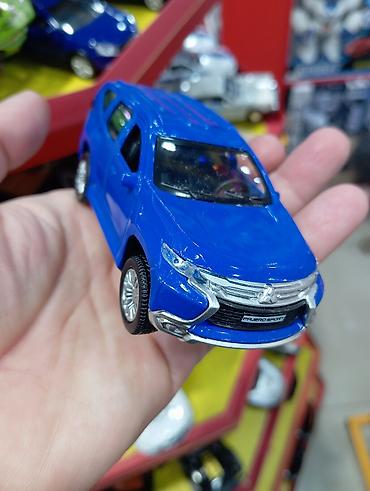 Спорт и хобби: Mitsubishi Pajero Sport metal oyuncaq avtomobil modeli - Miqyas — 1