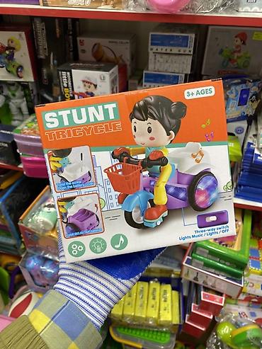игрушечный квадрокоптер: Музыкальная игрушка **Stunt Tricycle** — яркий детский трицикл с — 1
