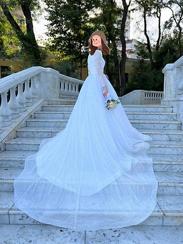 tac: - Gəlinlik modeli: klassik ball-gown siluet - Rəng: qar kimi ağ, incə — 1