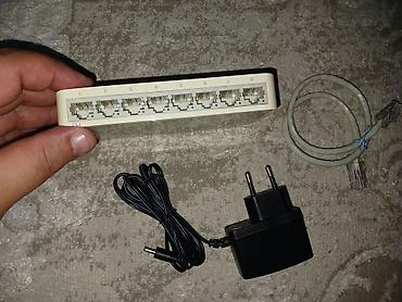 Модемы и сетевое оборудование: Коммутатор 8 портовый TP-Link TL-SF1008D 8-port switch (8utp 100mbps) — 1