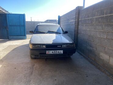 антена на авто: Mazda 626: 1991 г., 2 л, Механика, Бензин