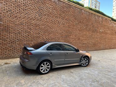 Mitsubishi: Mitsubishi Lancer: 2 l | 2013 il 199000 km Sedan — 7