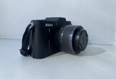 Фотоаппараты: Nikon 1 V1 — компактный беззеркальный фотоаппарат. Идеально подходит