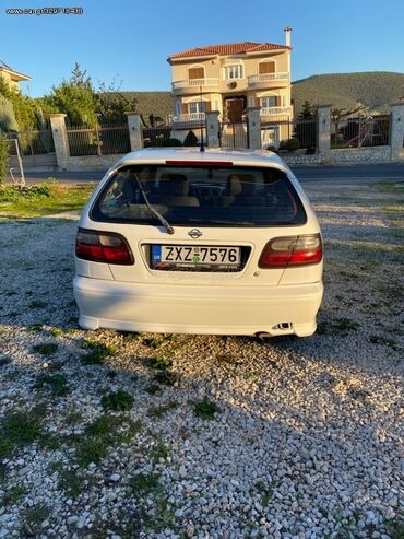 Nissan: Nissan Almera: 1.4 l. | 2000 έ. Χάτσμπακ