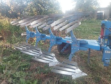 трава измельчитель: Оборотный навесной плуг, 4-корпусный, с решётчатыми отвалами — 2