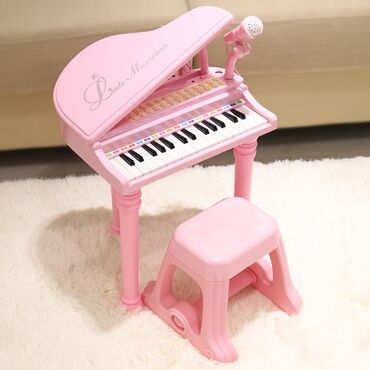 детские пианино: Детское пианино синтезатор с микрофоном и стульчиком. С этим роялем