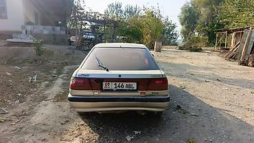nisan leaf: Mazda 626: 1990 г., 2.2 л, Механика, Бензин, Хэтчбэк — 4