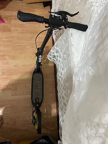 Городской самокат City Riding Scooter - Складывающаяся рама из