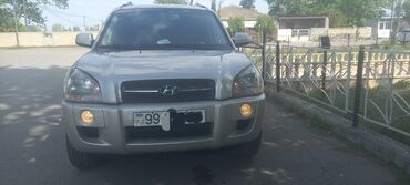 фольксваген пассат б5 1 8 турбо: Hyundai Tucson: 2 л | 2006 г. Седан