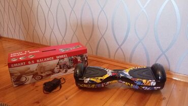 сколько стоит гироскутер в азербайджане: Segway hədiyyə alinib uşaga. Marag gostermediyinden satılır. Evdə