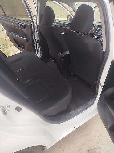 fielder: Toyota Corolla Fielder Hybrid – universal kuzovlu, ağ rəng. - Hibrid — 8