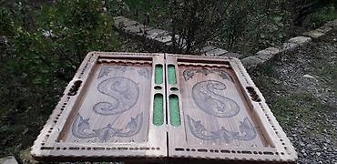 Nərdlər: Əl işi olan bu taxta nərd dəsti özünəməxsus oyma naxışları ilə — 17